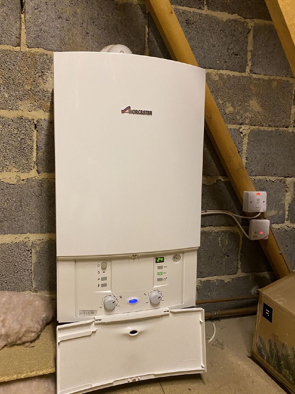 A newly installed Worcester Bosch boiler in a loft